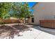 Backyard featuring hot tub, built-in grill, and gravel ground cover at 113 S Ocean Dr, Gilbert, AZ 85233