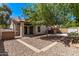 Backyard featuring hot tub, built-in grill, and covered patio area at 113 S Ocean Dr, Gilbert, AZ 85233