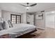Spacious main bedroom with hardwood floors, ensuite bathroom, and walk-in closet at 113 S Ocean Dr, Gilbert, AZ 85233