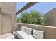 Relaxing balcony featuring cushioned seating and an open view, perfect for outdoor enjoyment at 11333 N 92Nd St # 2049, Scottsdale, AZ 85260