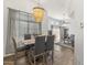 Dining room with a decorative chandelier and large window at 11333 N 92Nd St # 2049, Scottsdale, AZ 85260