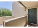 Welcoming entrance to unit featuring stylish door and an open balcony space at 11333 N 92Nd St # 2049, Scottsdale, AZ 85260