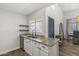 Kitchen with granite counters, undermount sink, and modern faucet at 11333 N 92Nd St # 2049, Scottsdale, AZ 85260