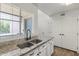 Kitchen with granite countertops, stainless steel sink, and lots of natural light at 11333 N 92Nd St # 2049, Scottsdale, AZ 85260