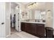 Elegant bathroom features a double vanity, stylish lighting, and modern finishes at 11466 N 162Nd Ln, Surprise, AZ 85379