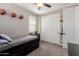 Bedroom featuring a trundle bed with lots of storage and closet with sliding doors at 11466 N 162Nd Ln, Surprise, AZ 85379