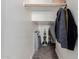 Walk-in closet featuring shelving and a clothing rod for storage at 11466 N 162Nd Ln, Surprise, AZ 85379
