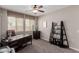 Inviting office space with a dark wood desk, comfortable chair, and modern decor at 11466 N 162Nd Ln, Surprise, AZ 85379