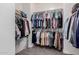 Large walk-in closet with ample storage and organization, providing plenty of room for clothes and accessories at 11466 N 162Nd Ln, Surprise, AZ 85379