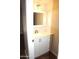 Compact bathroom with white vanity, offering efficient storage and a clean, modern look at 12245 N 21St Ave # 1, Phoenix, AZ 85029
