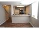 Inviting kitchen area boasts gray cabinets, stainless steel appliances, and a convenient breakfast bar at 12245 N 21St Ave # 1, Phoenix, AZ 85029