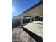 Large covered back patio perfect for outdoor gatherings, barbecue, or relaxing at 12422 N 121St Dr, El Mirage, AZ 85335