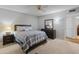 Bedroom boasts carpet, a ceiling fan, and a dresser at 12714 W Copperstone Dr, Sun City West, AZ 85375