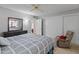 Bedroom with carpet, a dresser, and slider closet doors at 12714 W Copperstone Dr, Sun City West, AZ 85375