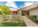 Charming home featuring a cozy front porch and manicured garden at 12714 W Copperstone Dr, Sun City West, AZ 85375