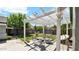 Relaxing backyard seating area under a pergola, perfect for entertaining guests at 139 W Granada Rd, Phoenix, AZ 85003