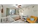 Charming bedroom featuring a daybed, crib, and a whimsical jungle-themed mural at 139 W Granada Rd, Phoenix, AZ 85003