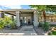 Inviting front porch with decorative columns and well-maintained landscaping at 139 W Granada Rd, Phoenix, AZ 85003