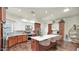 Well-appointed kitchen with a center island, stainless steel appliances, and stylish finishes at 139 W Granada Rd, Phoenix, AZ 85003