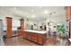 Spacious kitchen featuring a large island with seating and stainless steel appliances at 139 W Granada Rd, Phoenix, AZ 85003