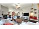 Bright and airy living room with hardwood floors, fireplace and stylish decor at 139 W Granada Rd, Phoenix, AZ 85003