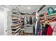 Organized walk-in closet providing ample storage with custom shelving and hanging racks at 139 W Granada Rd, Phoenix, AZ 85003