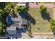 Birds eye view featuring a pool, lush yard and detached garage at 14749 E Pecos Rd, Gilbert, AZ 85295