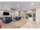 Open-concept living room featuring modern furnishings, neutral tones, and a seamless flow at 14749 E Pecos Rd, Gilbert, AZ 85295