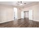 Bedroom with hardwood floors and access to bathroom and additional rooms at 1538 W Wagner Dr, Gilbert, AZ 85233