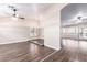 Spacious living room boasts wood-look floors and multiple ceiling fans, creating a comfortable living space at 1538 W Wagner Dr, Gilbert, AZ 85233