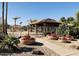 Community pool area with desert landscaping, seating and covered patio at 1538 W Wagner Dr, Gilbert, AZ 85233