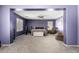Spacious bedroom featuring a ceiling fan, plush carpeting, and multiple windows for natural light at 18484 W Westfall Way, Surprise, AZ 85374