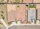 Aerial view of backyard featuring an artificial turf area and hardscaped desert landscaping at 18501 E Donato Dr, Gold Canyon, AZ 85118
