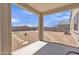 Spacious backyard featuring rock landscaping, a patio, and privacy fence at 18501 E Donato Dr, Gold Canyon, AZ 85118