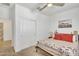 A well-lit bedroom features a ceiling fan and closet with sliding doors at 18501 E Donato Dr, Gold Canyon, AZ 85118
