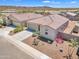 Beautiful single-story home with desert landscaping, featuring a two-car garage and a lovely yard at 18501 E Donato Dr, Gold Canyon, AZ 85118