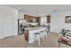 Stylish kitchen with stainless steel appliances, granite counters, and seating at the kitchen island at 18501 E Donato Dr, Gold Canyon, AZ 85118