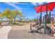 Modern playground with colorful equipment and shade features in community park at 18501 E Donato Dr, Gold Canyon, AZ 85118