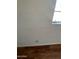 Close up of a wall with noticeable cracking and wear, next to a window at 1907 W Gardenia Dr, Phoenix, AZ 85021