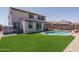 This home features a private backyard oasis with a sparkling pool and lush turf at 19690 W Marshall Ave, Litchfield Park, AZ 85340