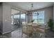 Bright breakfast nook with views of the backyard pool at 19690 W Marshall Ave, Litchfield Park, AZ 85340