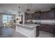 Stylish kitchen with granite island, ample cabinet space, and modern appliances at 19690 W Marshall Ave, Litchfield Park, AZ 85340