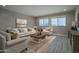 Bright living room with scenic views from its plentiful windows at 19690 W Marshall Ave, Litchfield Park, AZ 85340