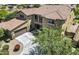 Stunning two-story home featuring a tile roof, private balcony, and a spacious three-car garage at 19943 E Strawberry Dr, Queen Creek, AZ 85142
