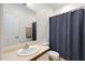Bright bathroom with a neutral countertop vanity and enclosed shower, offering a functional and tidy space at 204 S Valle Verde --, Mesa, AZ 85208