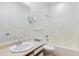 Clean bathroom featuring a single sink vanity, toilet, and bathtub-shower combination, designed for essential functionality at 204 S Valle Verde --, Mesa, AZ 85208