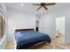 Bright bedroom with a ceiling fan and neutral decor, providing a simple and relaxing retreat within the home at 204 S Valle Verde --, Mesa, AZ 85208