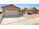 Charming single-story home with a two-car garage and desert landscaping at 204 S Valle Verde --, Mesa, AZ 85208
