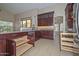 A kitchen with custom cabinets, stainless steel appliances, and granite countertops provides ample space at 21532 N 65Th Ave, Glendale, AZ 85308