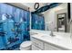 Bathroom with vanity, commode and shower/tub combination with themed curtain at 220 N 22Nd Pl # 2029, Mesa, AZ 85213
